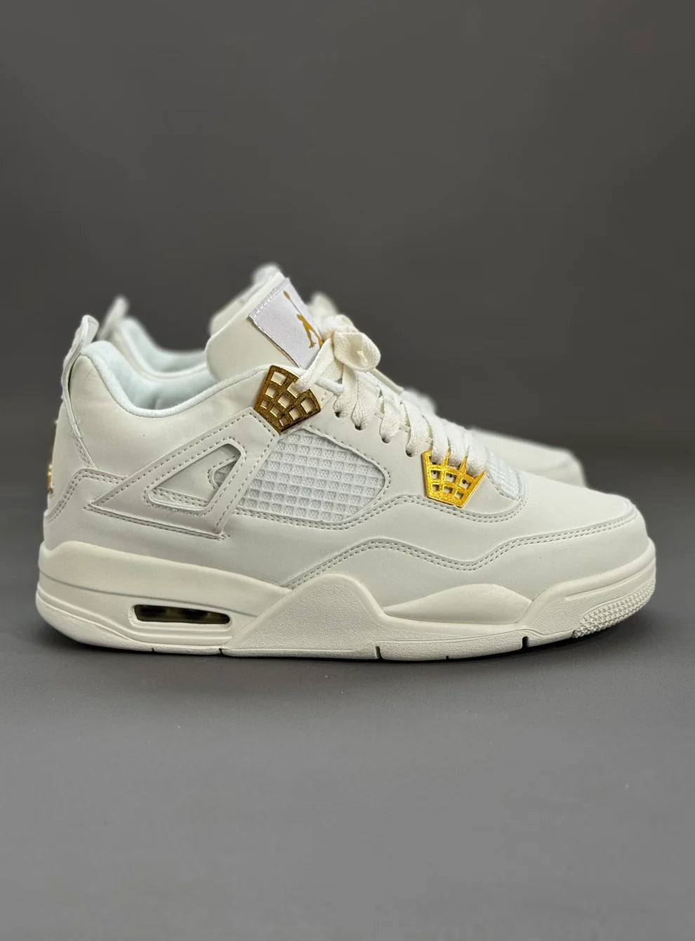 Air Jordan 4 Retro Metallic Gold